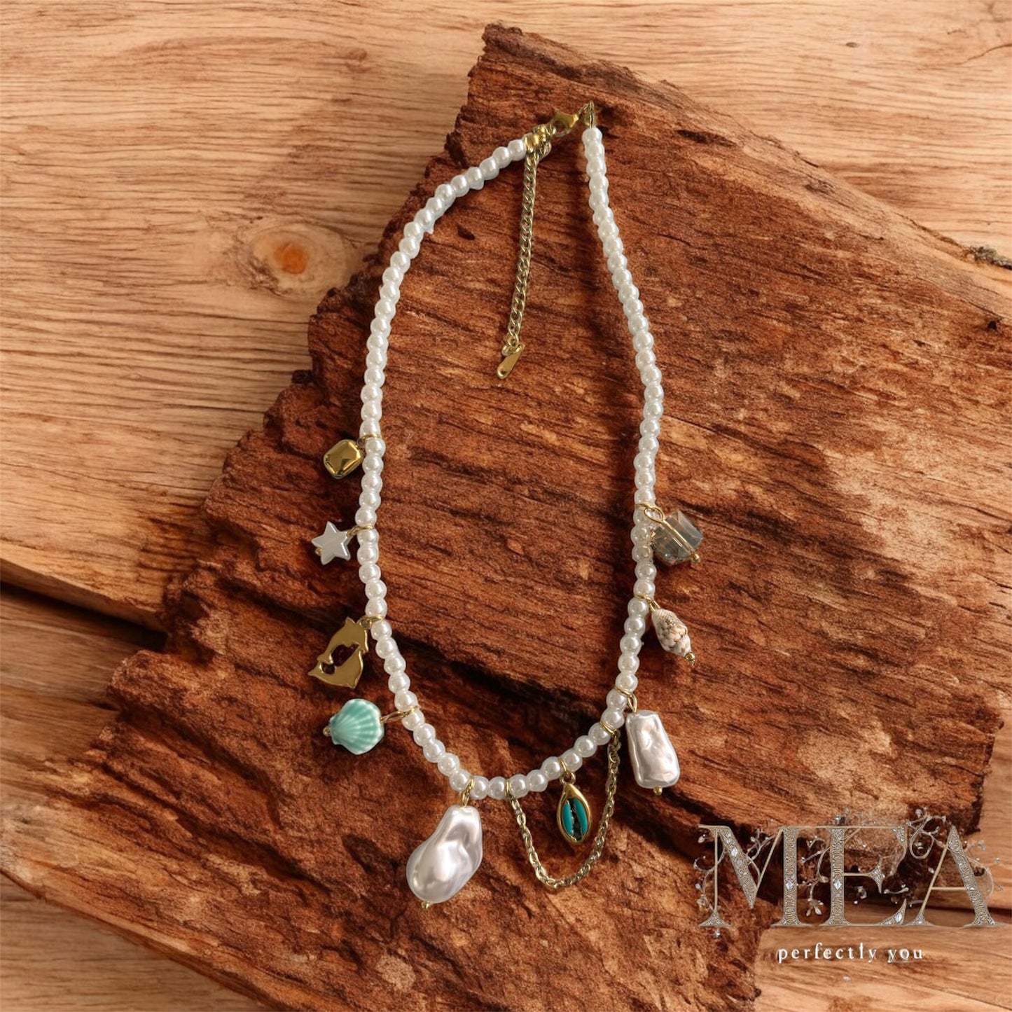 “Ocean Muse Pearl Charm Necklace – Boho Statement Piece”