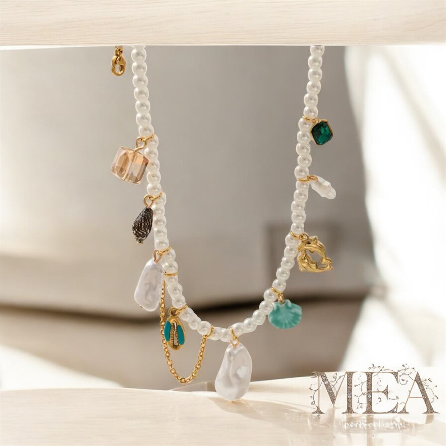 “Ocean Muse Pearl Charm Necklace – Boho Statement Piece”