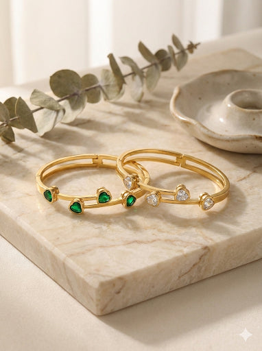 Radiant Heart Duo: Gold Hinged Bangle Set with Emerald & Diamond CZ Stones