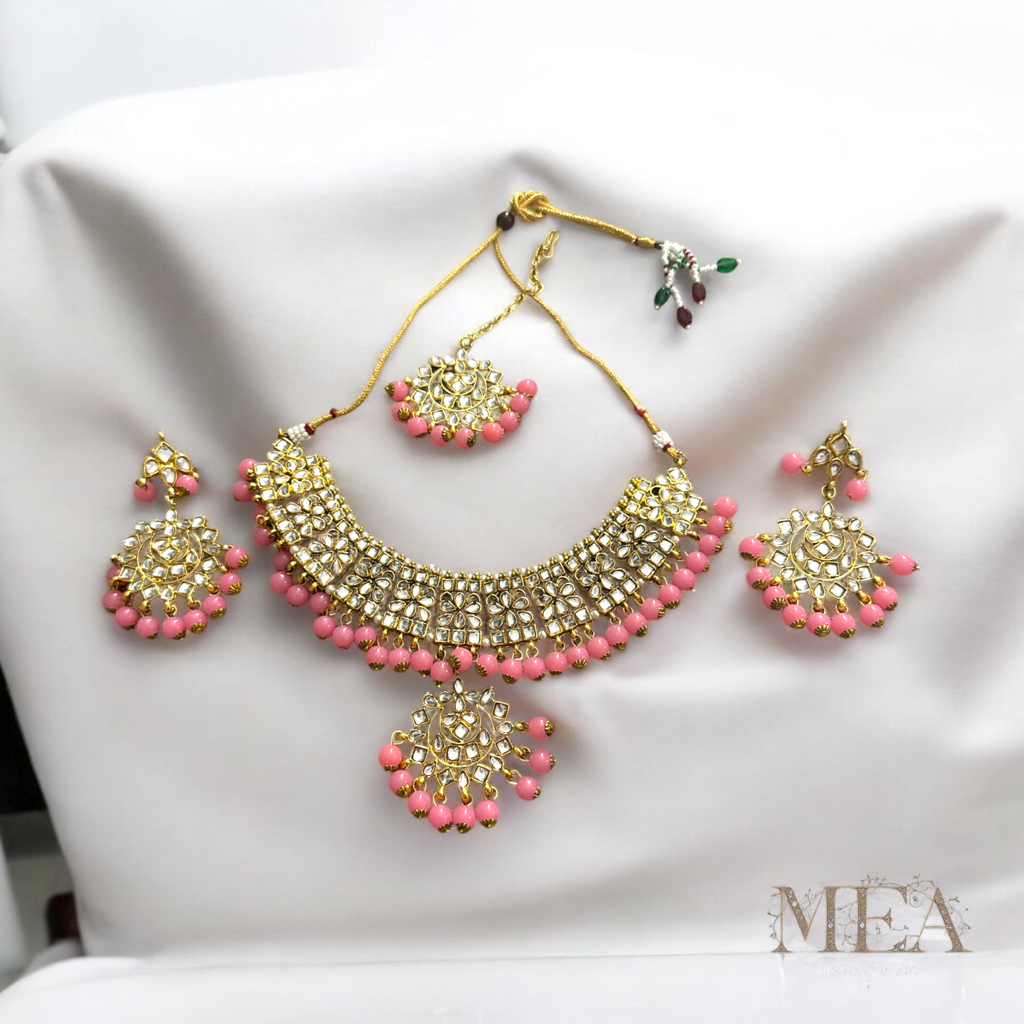 Exquisite Kundan Necklace and Earring Set with Matha Tikka in pink