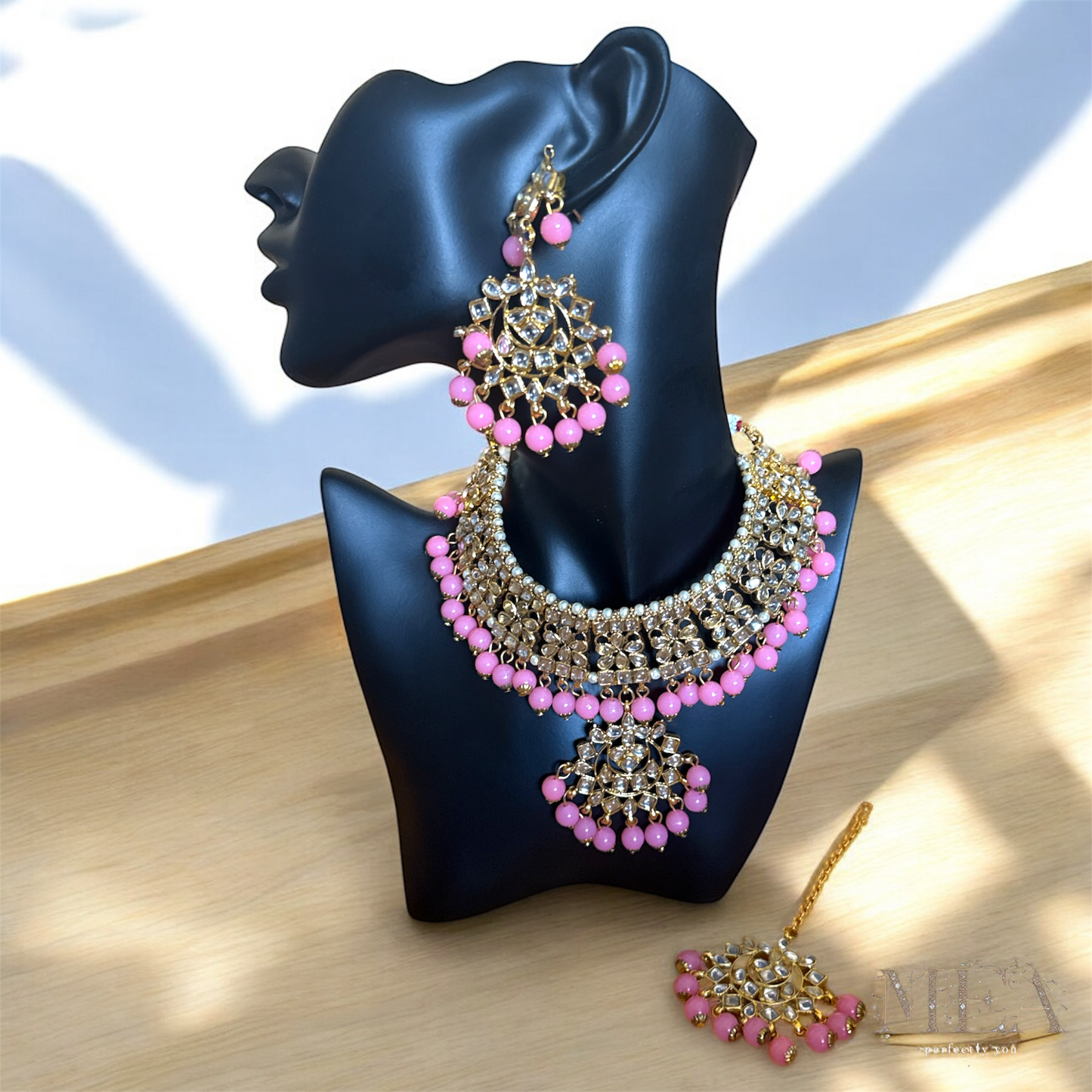 Exquisite Kundan Necklace and Earring Set with Matha Tikka in pink